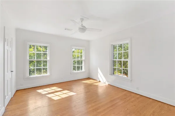 an empty room with windows