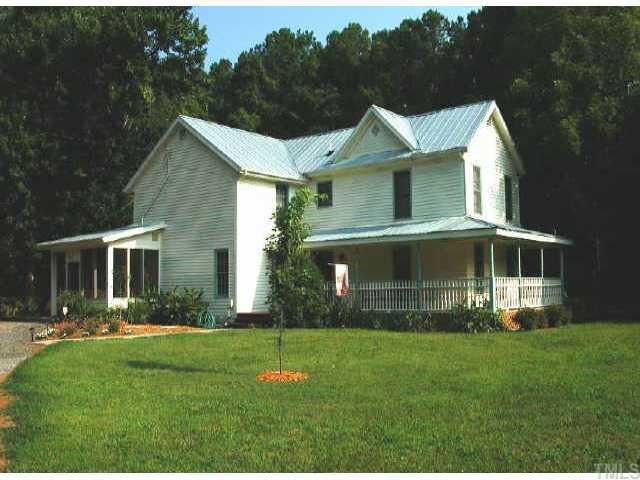 13201 Old Creedmoor Road Raleigh, NC 27613 - Photo 1 of 10 a view of a house with a yard