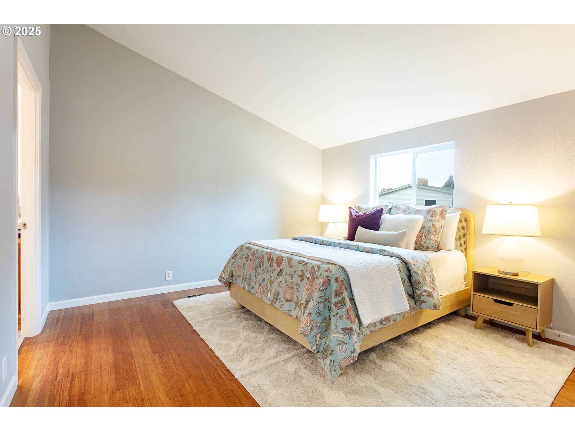 2655 Atticus Way Eugene, OR 97404 - Photo 14 of 27 a bedroom with a bed and a night stand