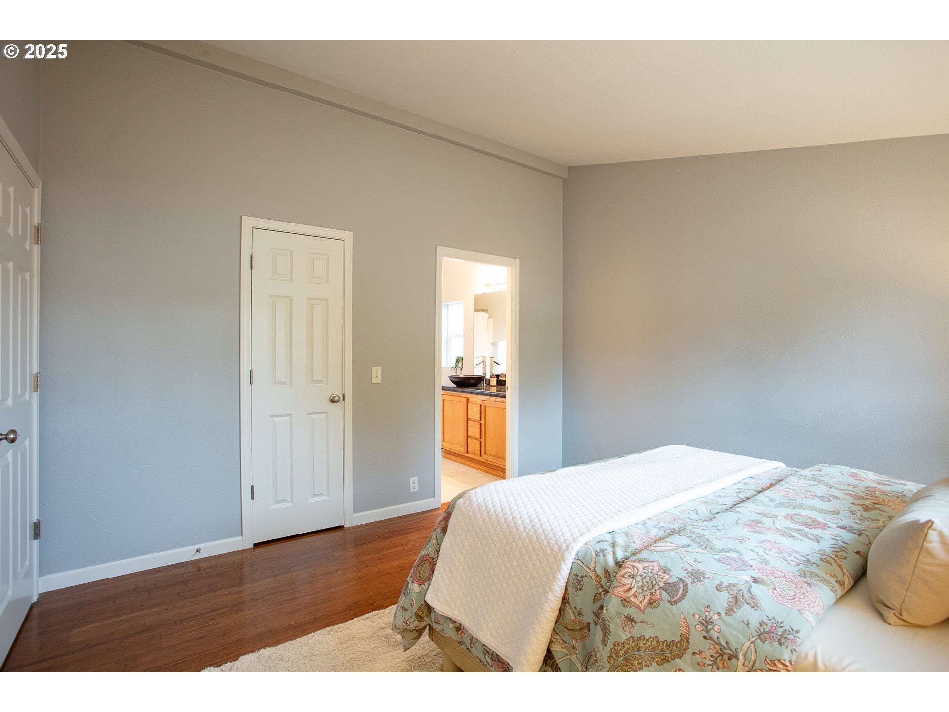 2655 Atticus Way Eugene, OR 97404 - Photo 16 of 27 a bedroom with a bed and a night stand