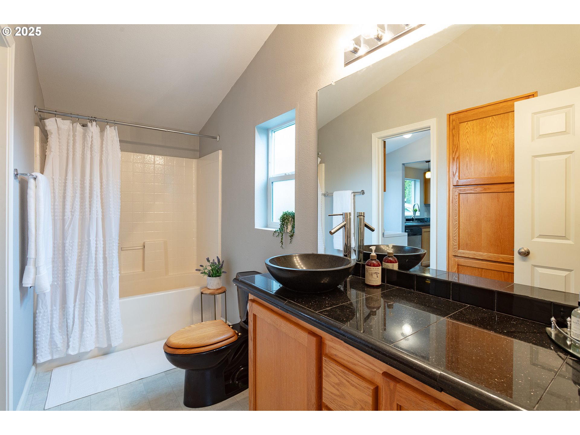 2655 Atticus Way Eugene, OR 97404 - Photo 17 of 27 a kitchen with a sink and large window