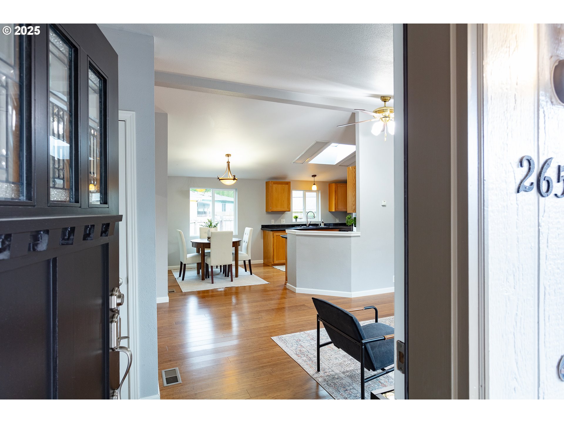 2655 Atticus Way Eugene, OR 97404 - Photo 4 of 27 a living room with furniture and a table