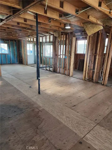 a view of a backyard with sitting area