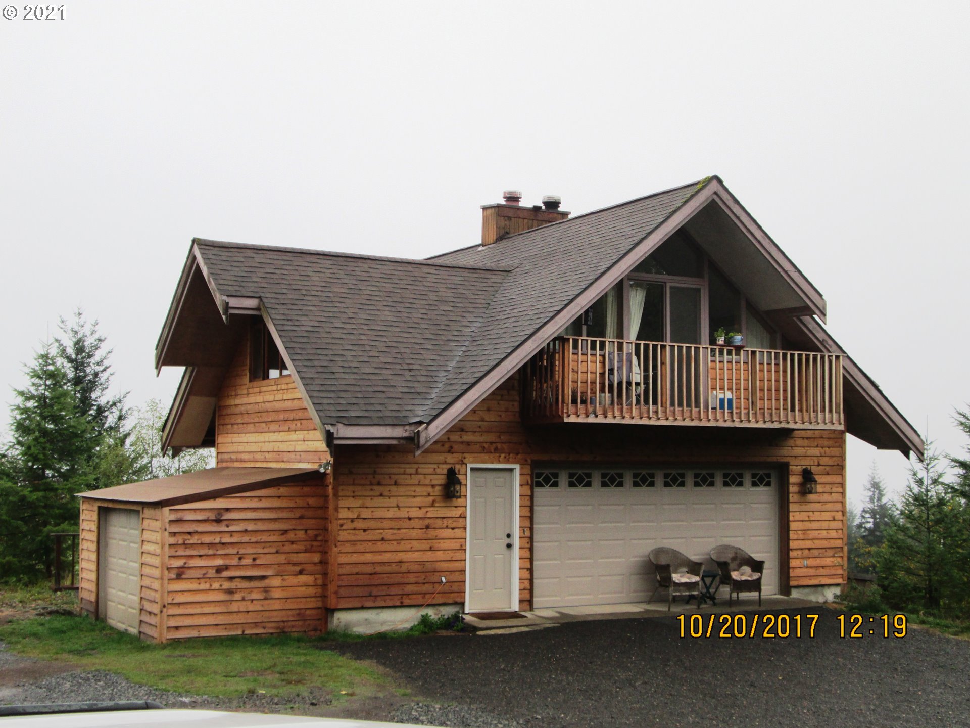 9101 Northeast Livingston Road Camas, WA 98607 - Photo 1 of 1 a view of a house with a balcony