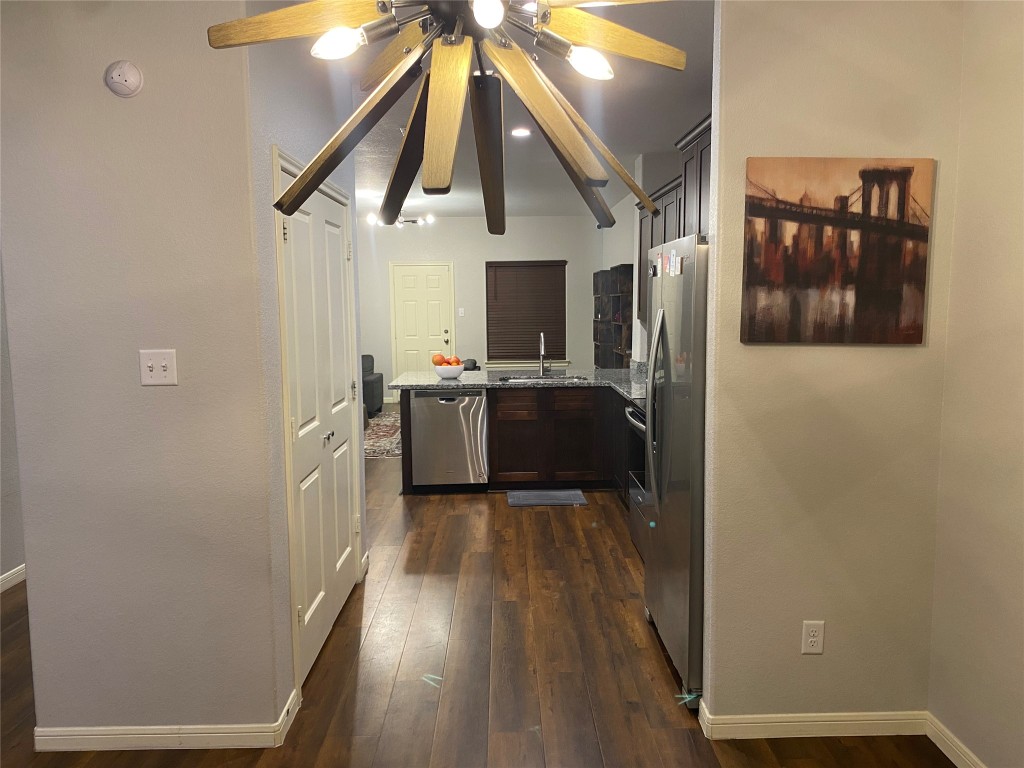 6513 Knox Street Houston, TX 77091 - Photo 2 of 10 a view of a kitchen from the hallway