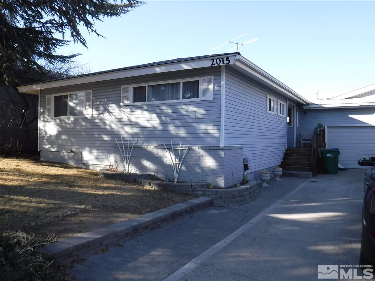 2015 Ives Avenue Reno, NV 89503 - Photo 2 of 21 a view of a house with yard