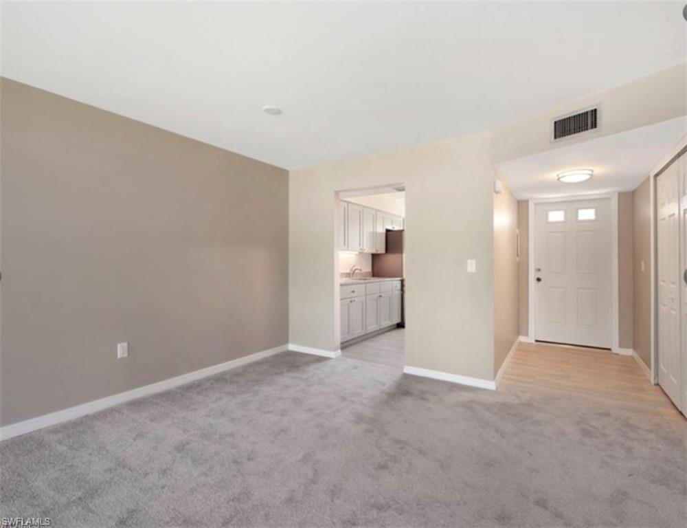 4900 Biscayne Drive, Unit 23 Naples, FL 34112 - Photo 3 of 12 a view of empty room