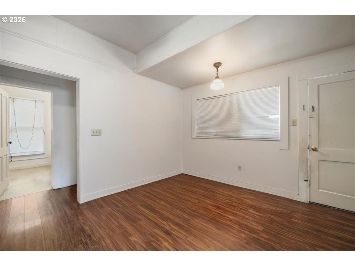 740 South 6th Street Cottage Grove, OR 97424 - Photo 13 of 21 wooden floor in an empty room