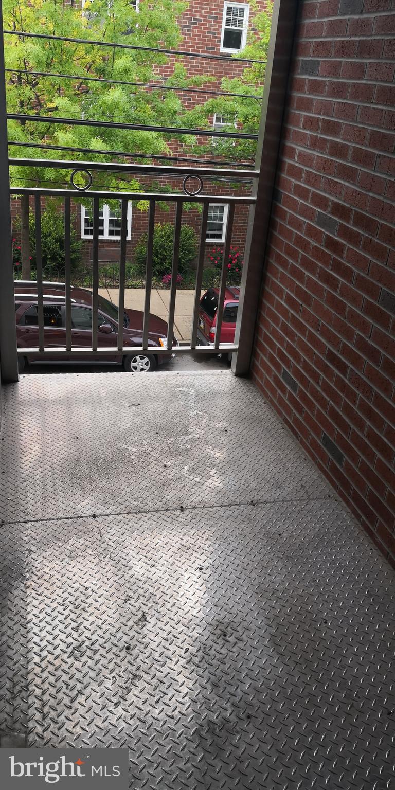 1008 Green Street Philadelphia, PA 19123 - Photo 30 of 40 a view of a backyard with a wooden fence