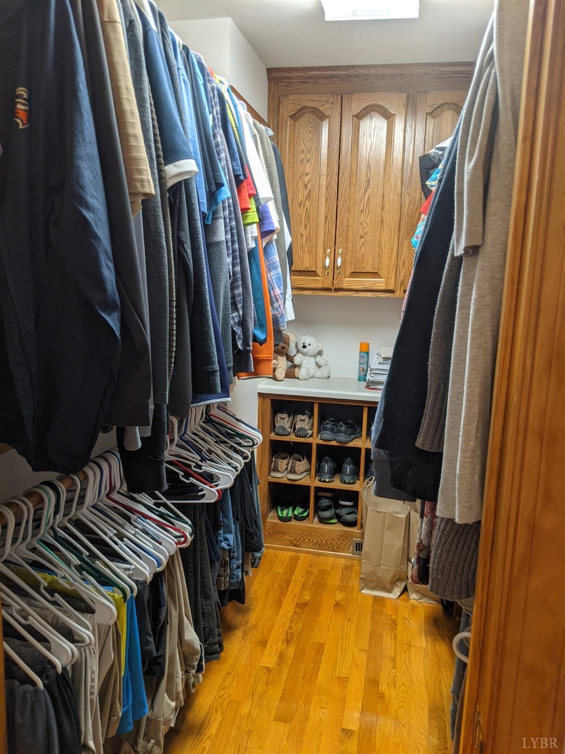 2206 South Fork Road Appomattox, VA 24522 - Photo 28 of 78 a view of walk in closet with clothes and shoes