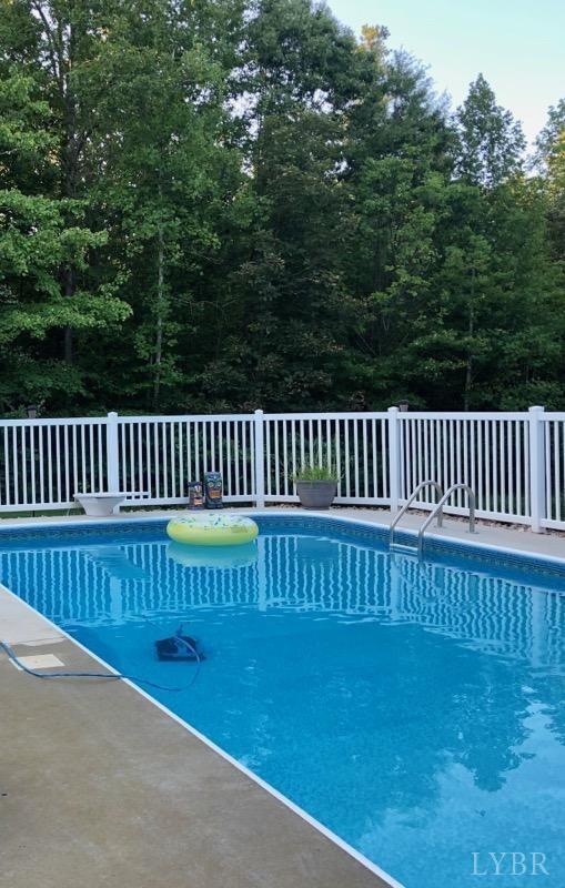 2206 South Fork Road Appomattox, VA 24522 - Photo 60 of 78 a view of a roof deck with a fence