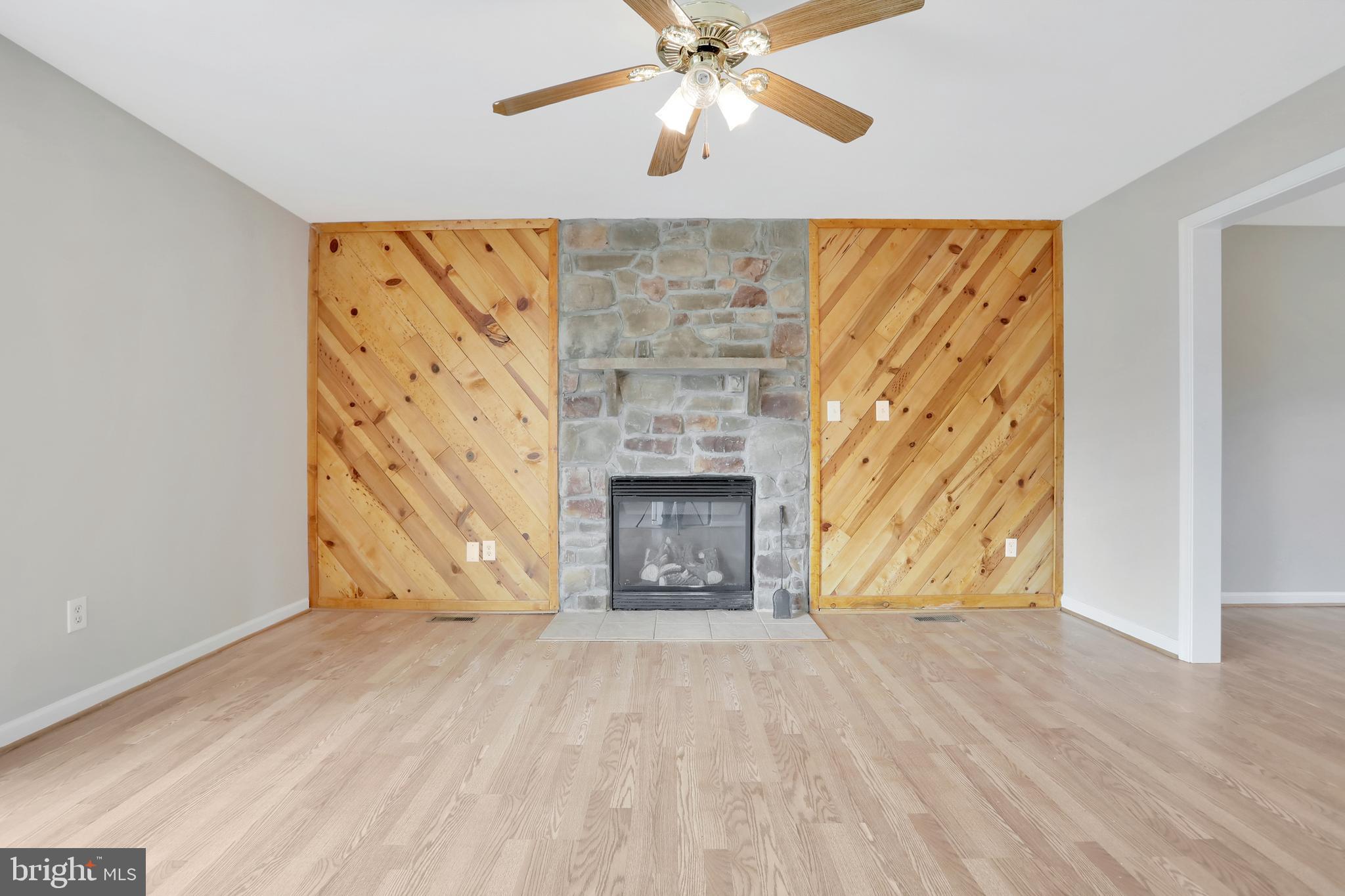 261 Fairview Road Gore, VA 22637 - Photo 13 of 45 Stone fireplace in family room
