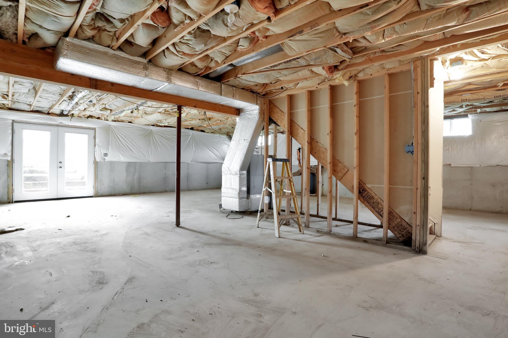 261 Fairview Road Gore, VA 22637 - Photo 35 of 45 Unfinished basement with door to rear yard