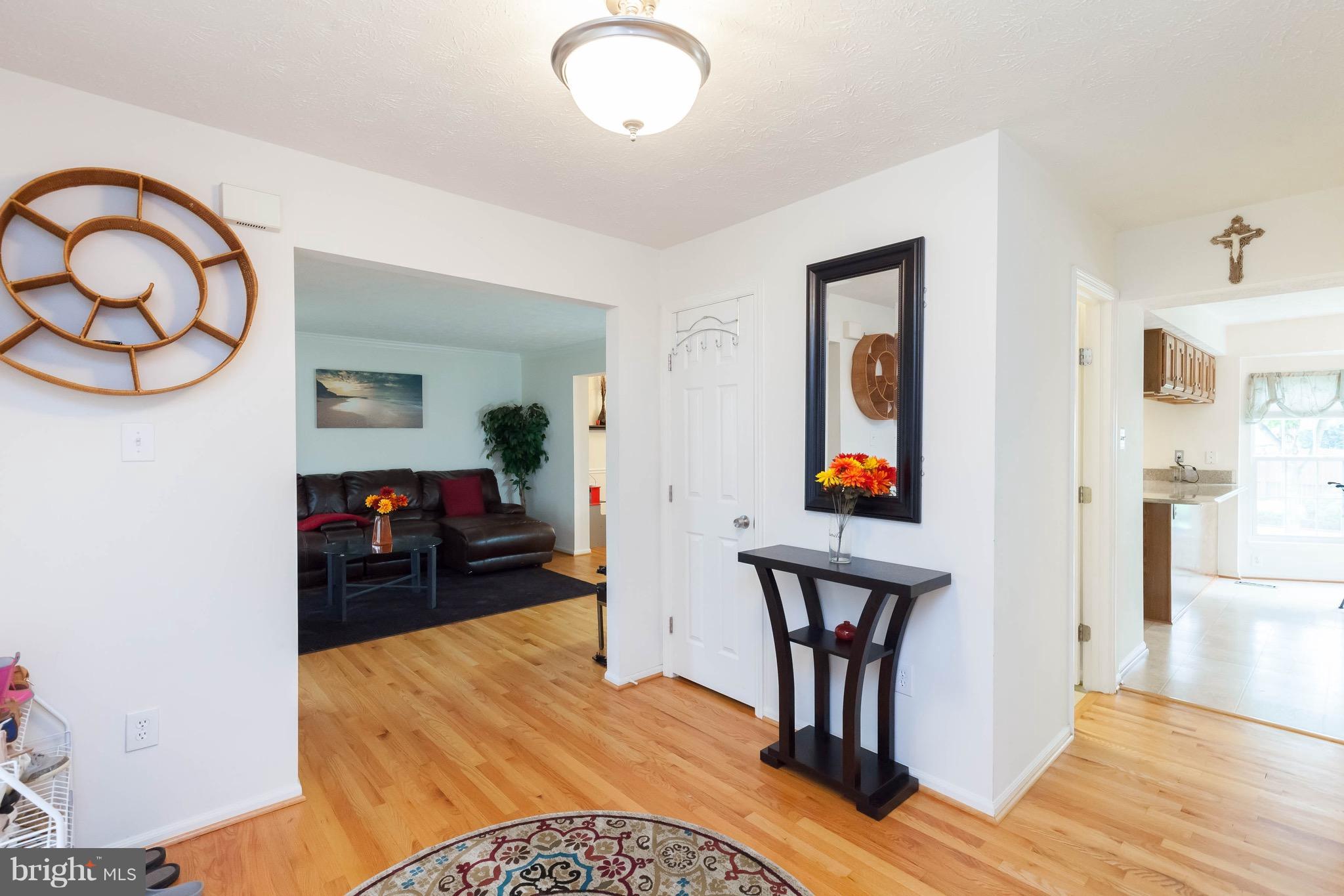 706 Monarch Ridge Road Frederick, MD 21703 - Photo 5 of 30 Foyer with beautiful hardwood floors