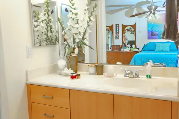 a utility room with sink washer and dryer