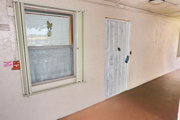 a kitchen with stainless steel appliances a stove a sink and a refrigerator