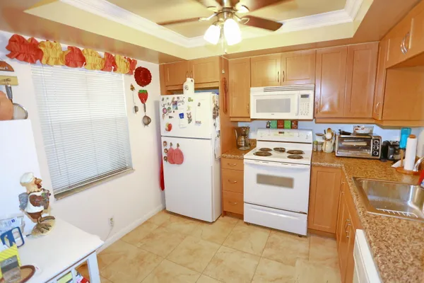 a kitchen with a stove and a microwave