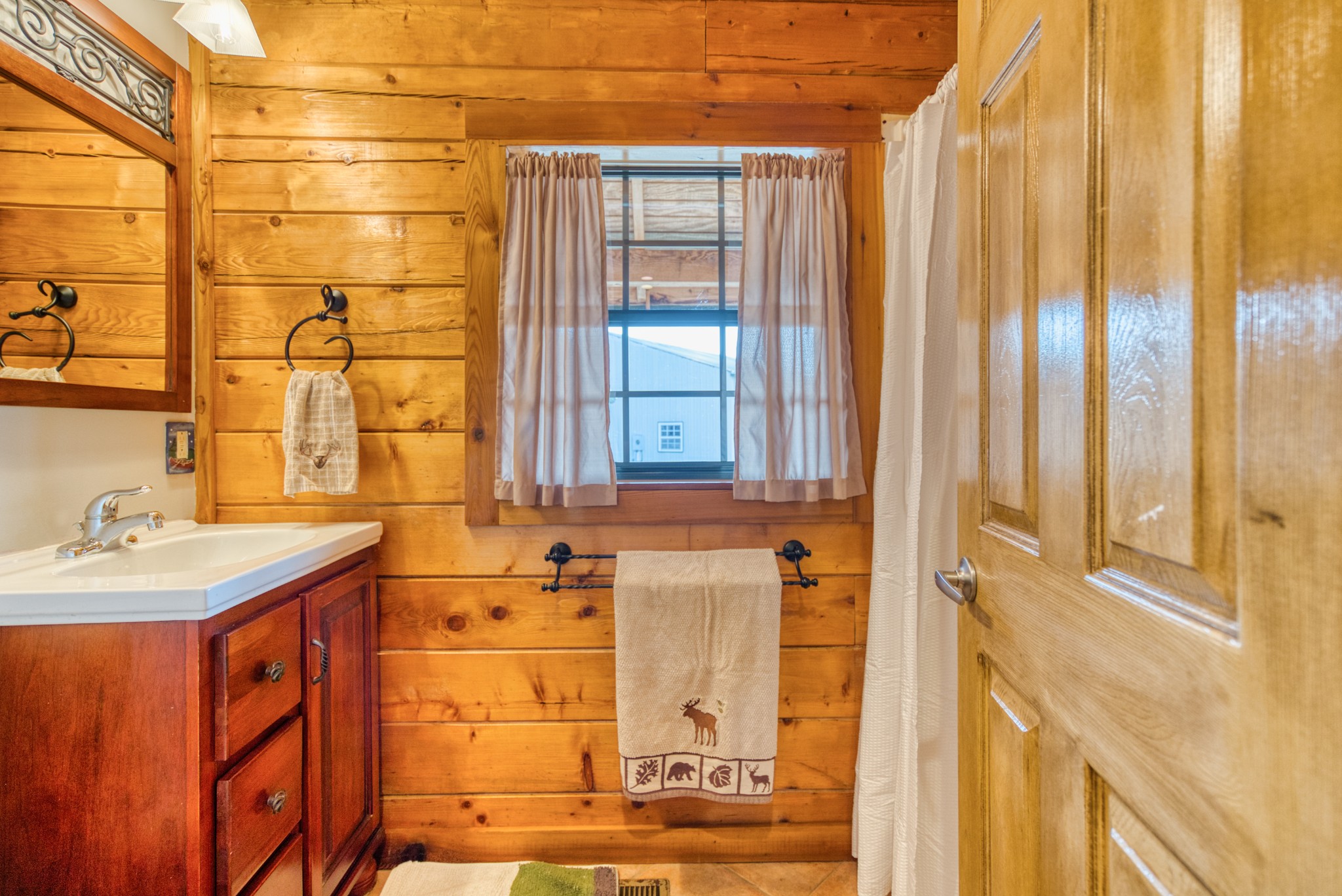2644 Franklin Road Russellville, KY 42276 - Photo 16 of 40 a bathroom with a sink and a mirror