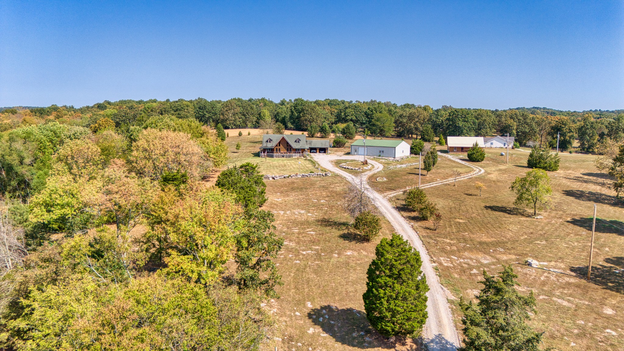 2644 Franklin Road Russellville, KY 42276 - Photo 38 of 40 a view of a swimming pool with an outdoor seating and a yard