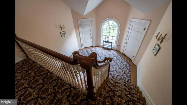 a view of entryway with a front door