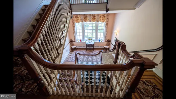 a view of a balcony with furniture