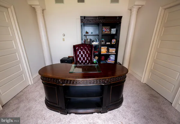 a kitchen with a stove and a refrigerator