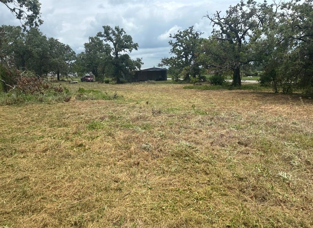 0 Rhoades Lane Springtown, TX 76082 - Photo 2 of 19 1 acre lot with mature trees with shop on it