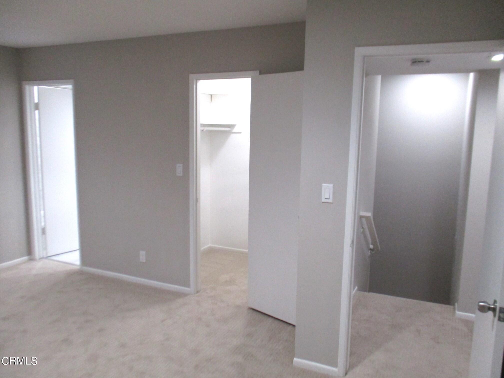 375 West Walnut Street Pasadena, CA 91103 - Photo 19 of 42 a view of an empty room with closet and mirror