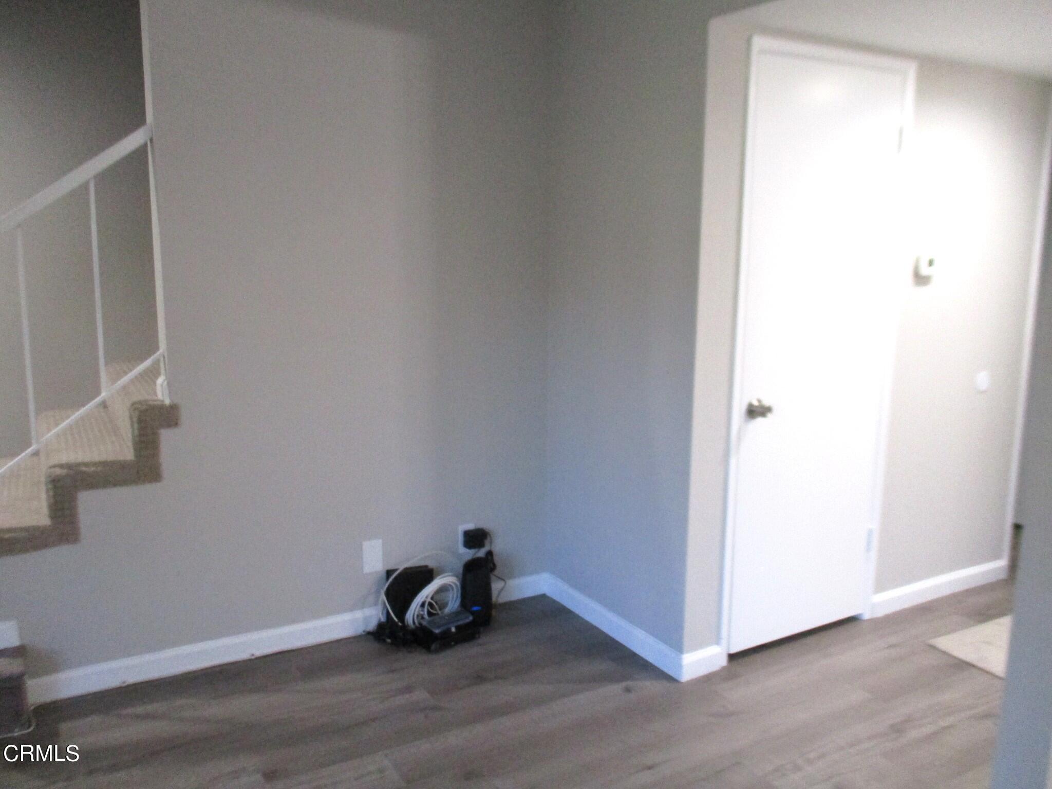 375 West Walnut Street Pasadena, CA 91103 - Photo 31 of 42 a view of a room with wooden floor and windows