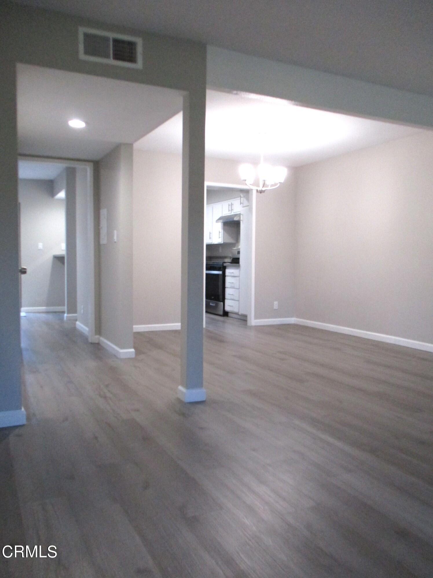 375 West Walnut Street Pasadena, CA 91103 - Photo 5 of 42 a view of a kitchen with wooden floor