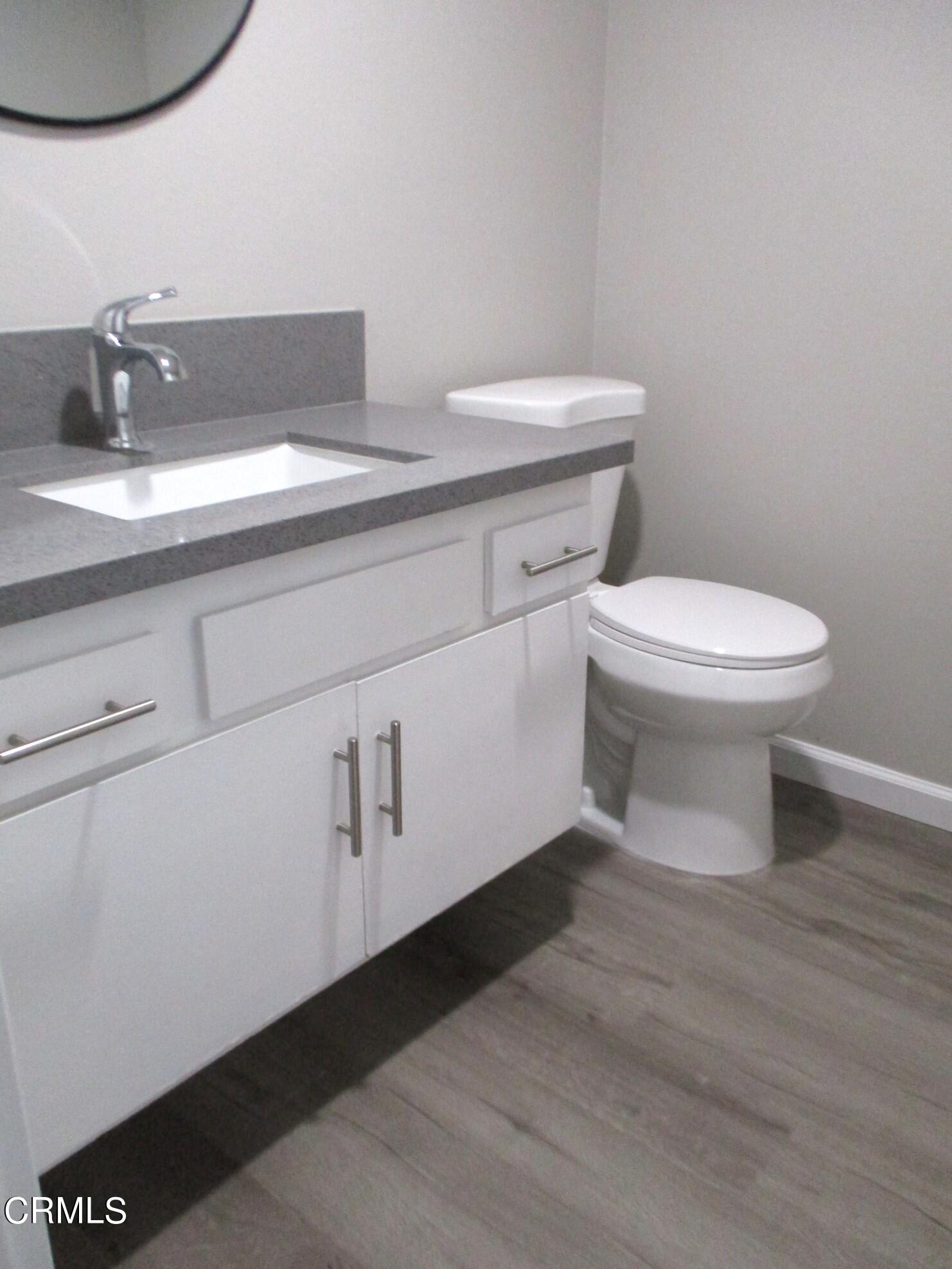 375 West Walnut Street Pasadena, CA 91103 - Photo 6 of 42 a bathroom with a toilet and a sink