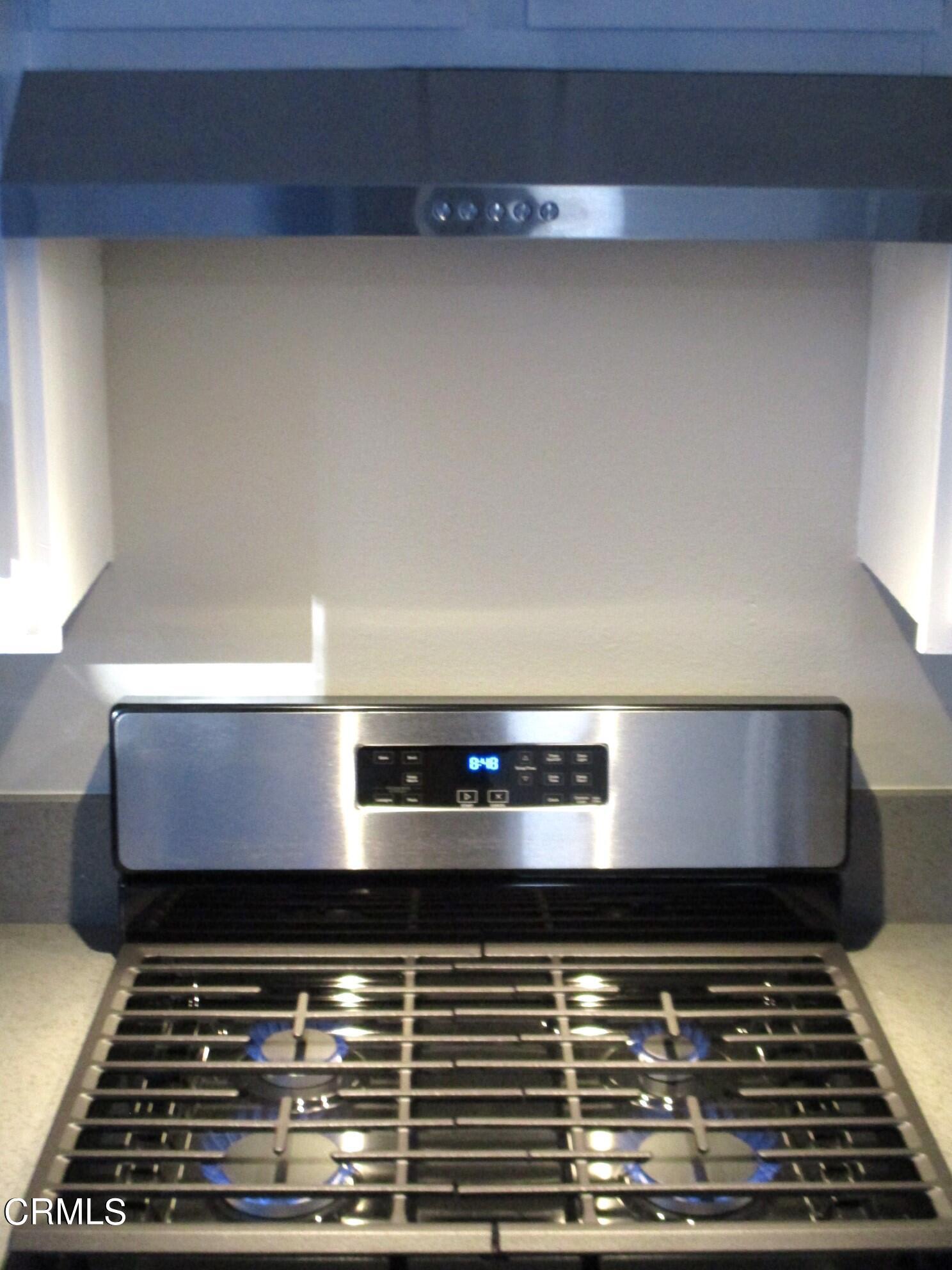 375 West Walnut Street Pasadena, CA 91103 - Photo 10 of 42 a stove top oven sitting inside of a kitchen
