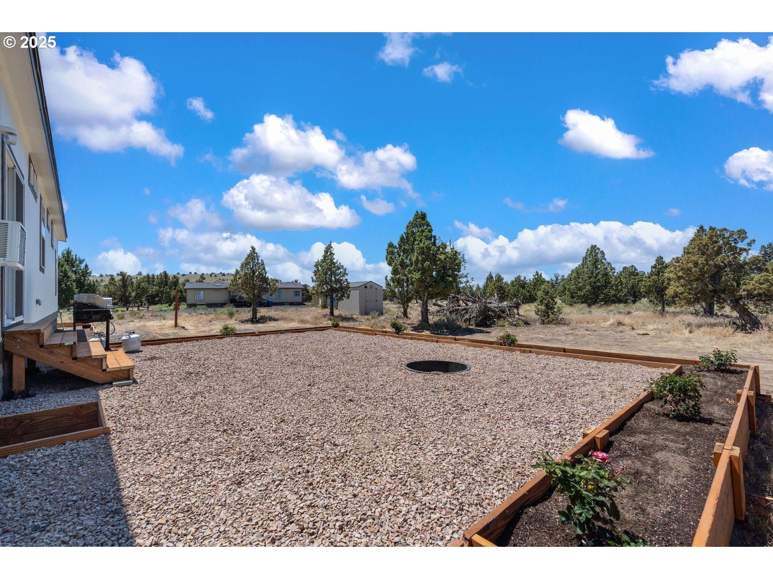 16277 Southeast Cahvilla Road Prineville, OR 97754 - Photo 13 of 22 a view of a backyard of a house