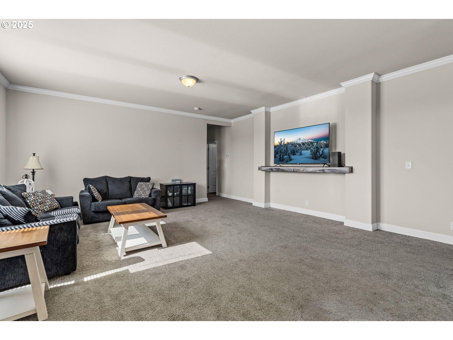 16277 Southeast Cahvilla Road Prineville, OR 97754 - Photo 17 of 22 a living room with furniture and a painting on the wall