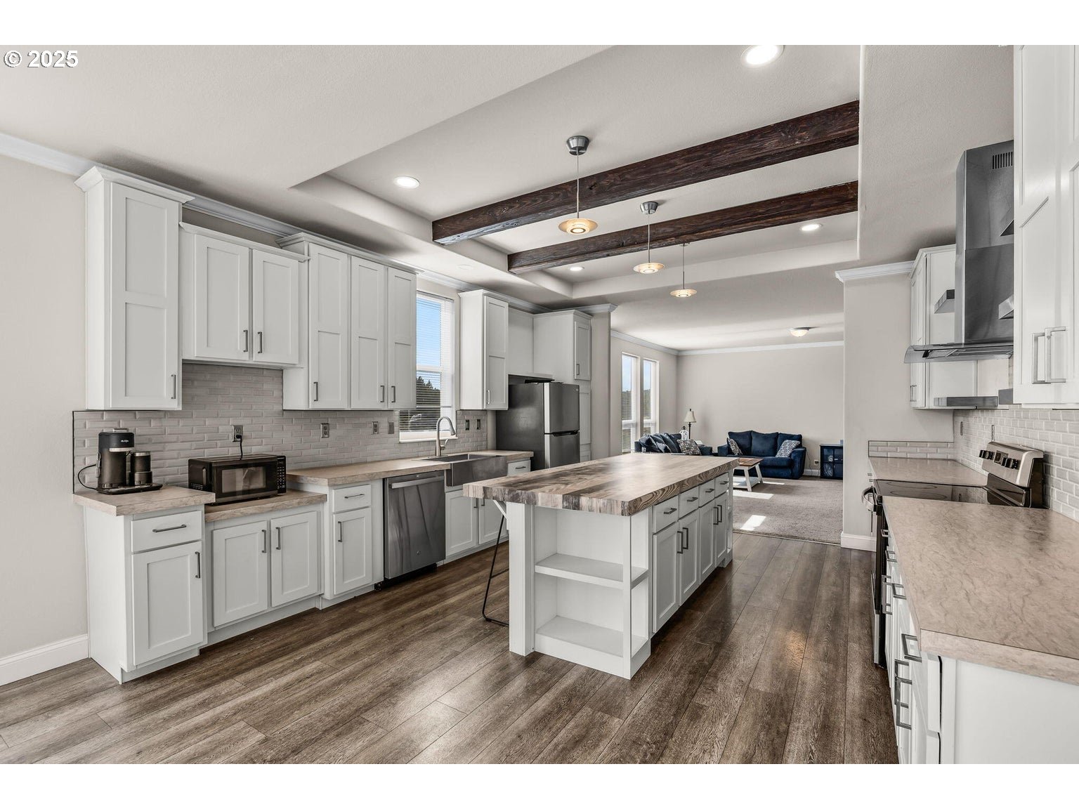 16277 Southeast Cahvilla Road Prineville, OR 97754 - Photo 19 of 22 a kitchen with sink stove and cabinets
