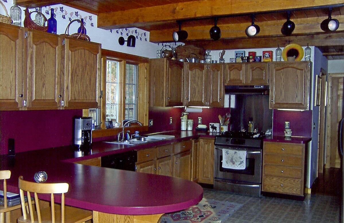 1304 George Carter Road Becket, MA 01223 - Photo 6 of 12 a view of a dining room with furniture and chandelier