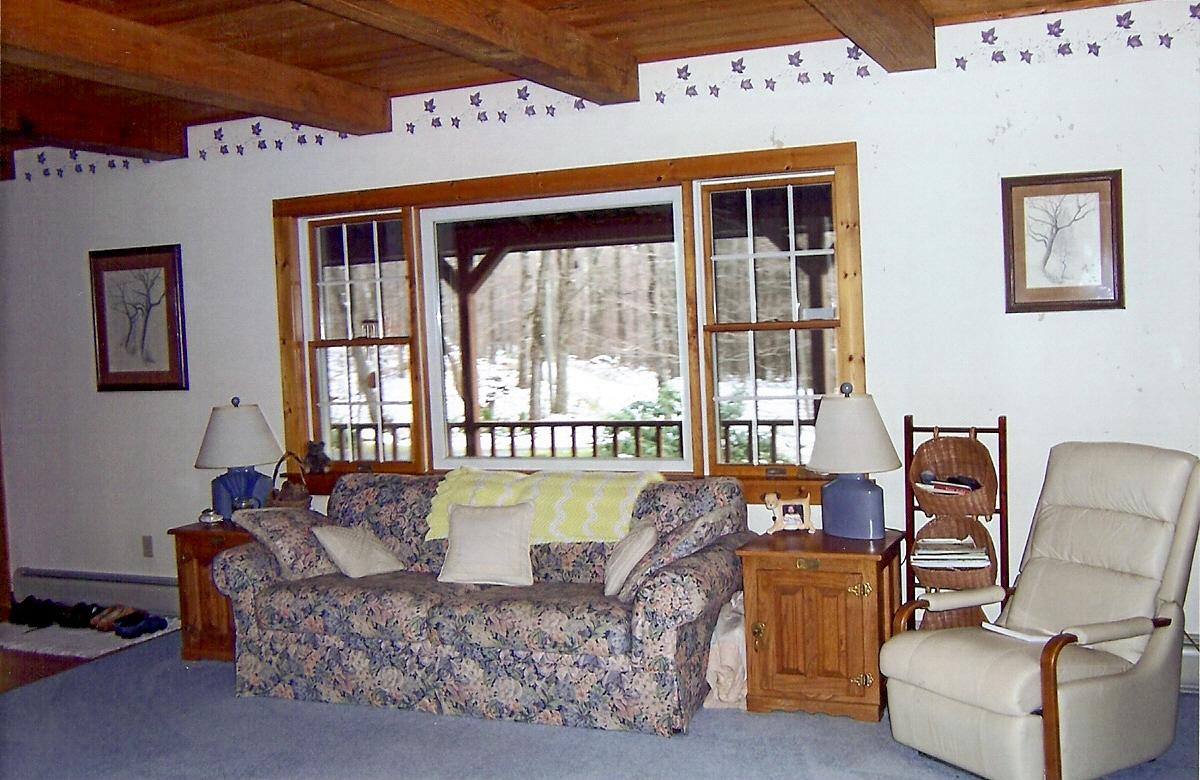 1304 George Carter Road Becket, MA 01223 - Photo 8 of 12 a living room with furniture and a window