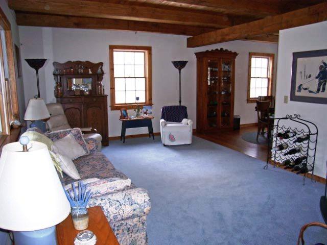 1304 George Carter Road Becket, MA 01223 - Photo 9 of 12 a living room with furniture and a window