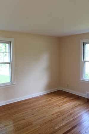 926 Plumtree Road Springfield, MA 01119 - Photo 14 of 21 a view of an empty room with wooden floor and a window