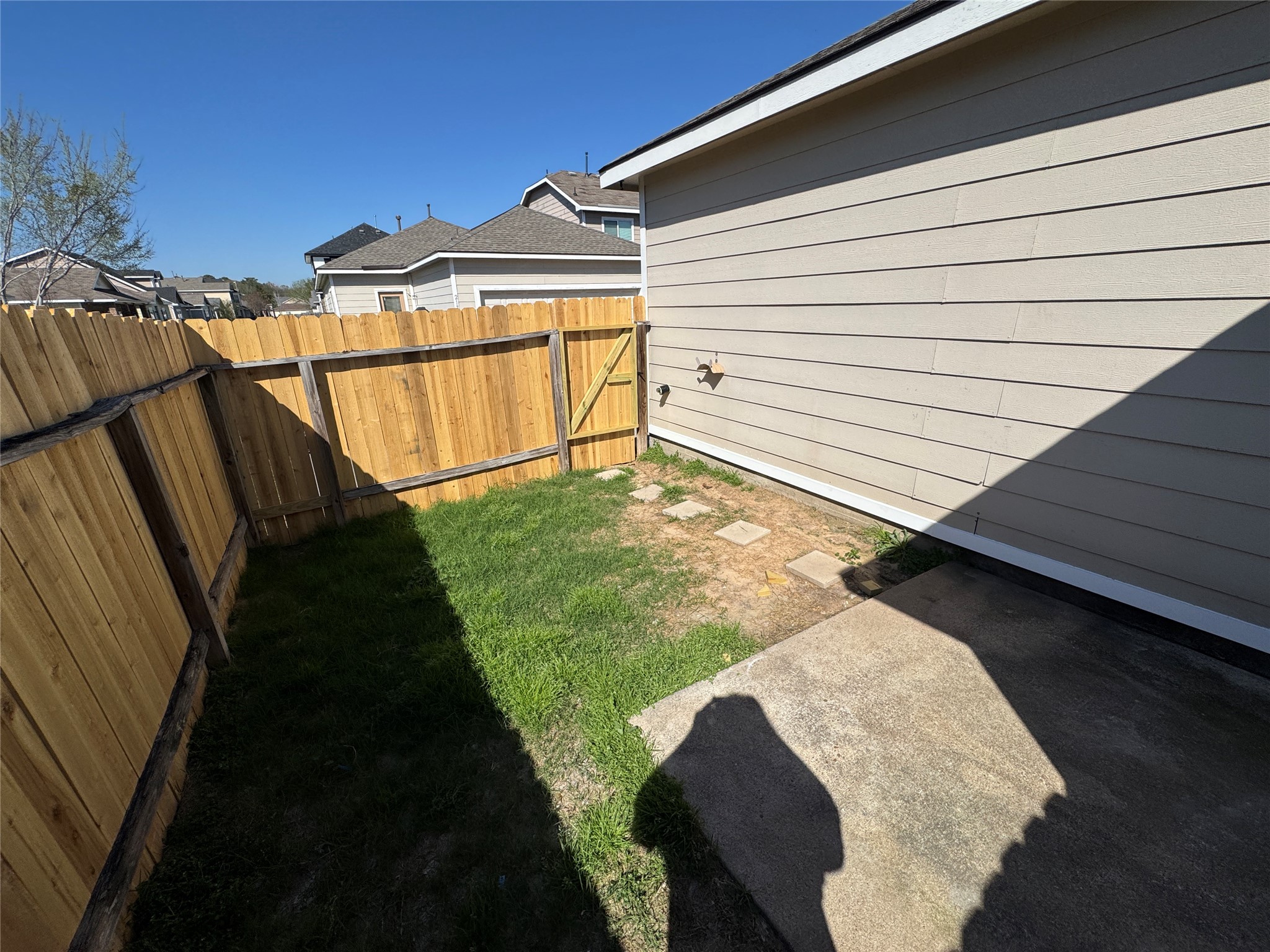 21719 Mossy Field Lane Spring, TX 77388 - Photo 26 of 44 a view of a backyard with a deck
