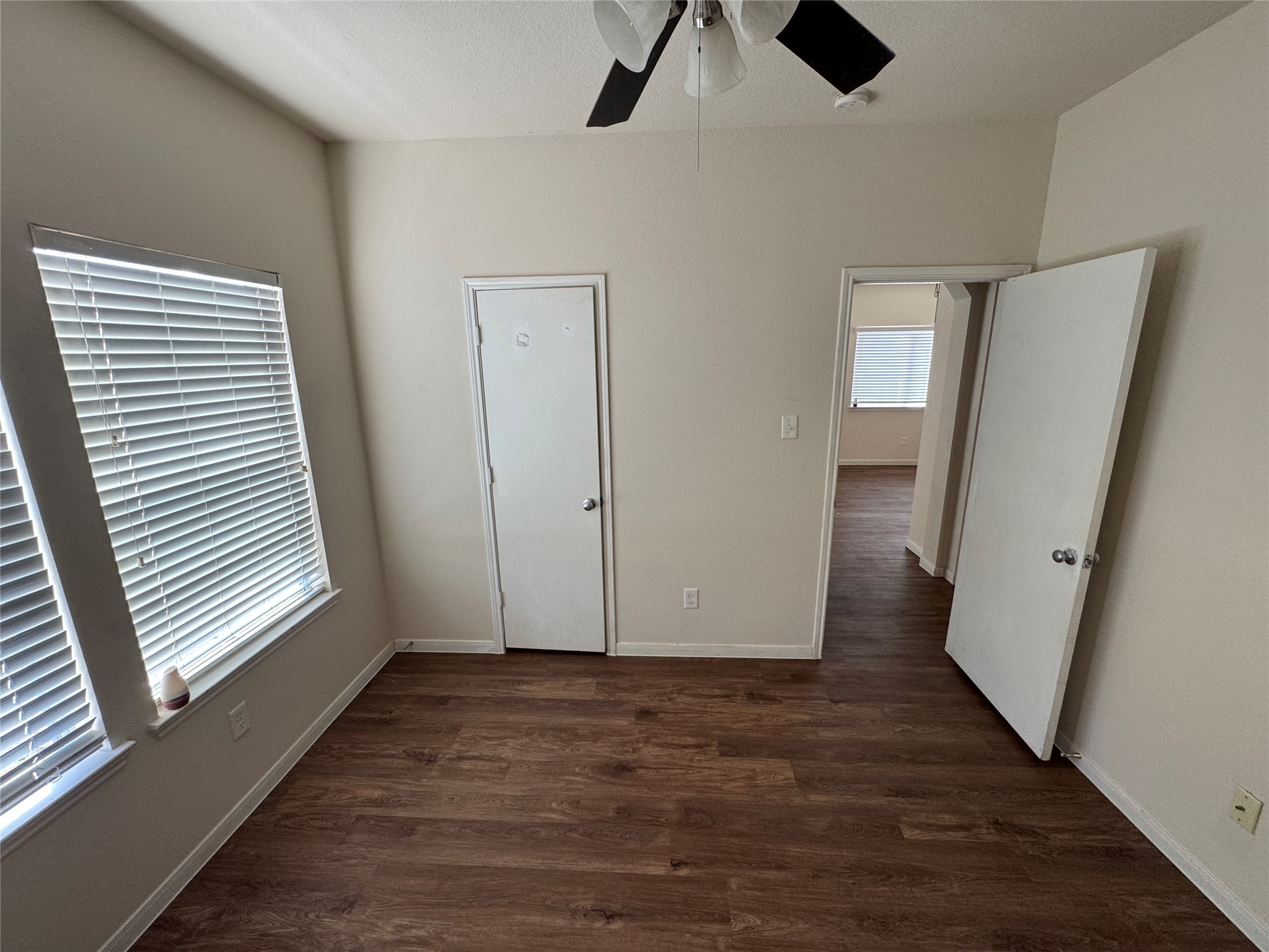 21719 Mossy Field Lane Spring, TX 77388 - Photo 31 of 44 an empty room with wooden floor and windows