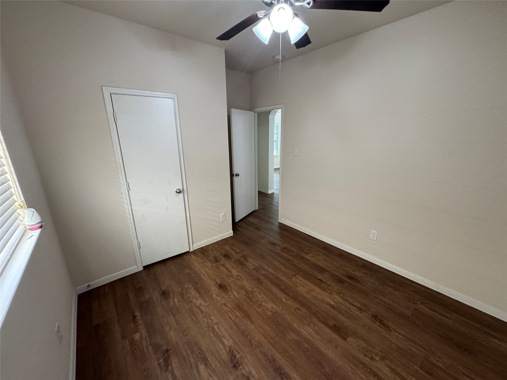 21719 Mossy Field Lane Spring, TX 77388 - Photo 33 of 44 wooden floor in an empty room with a window