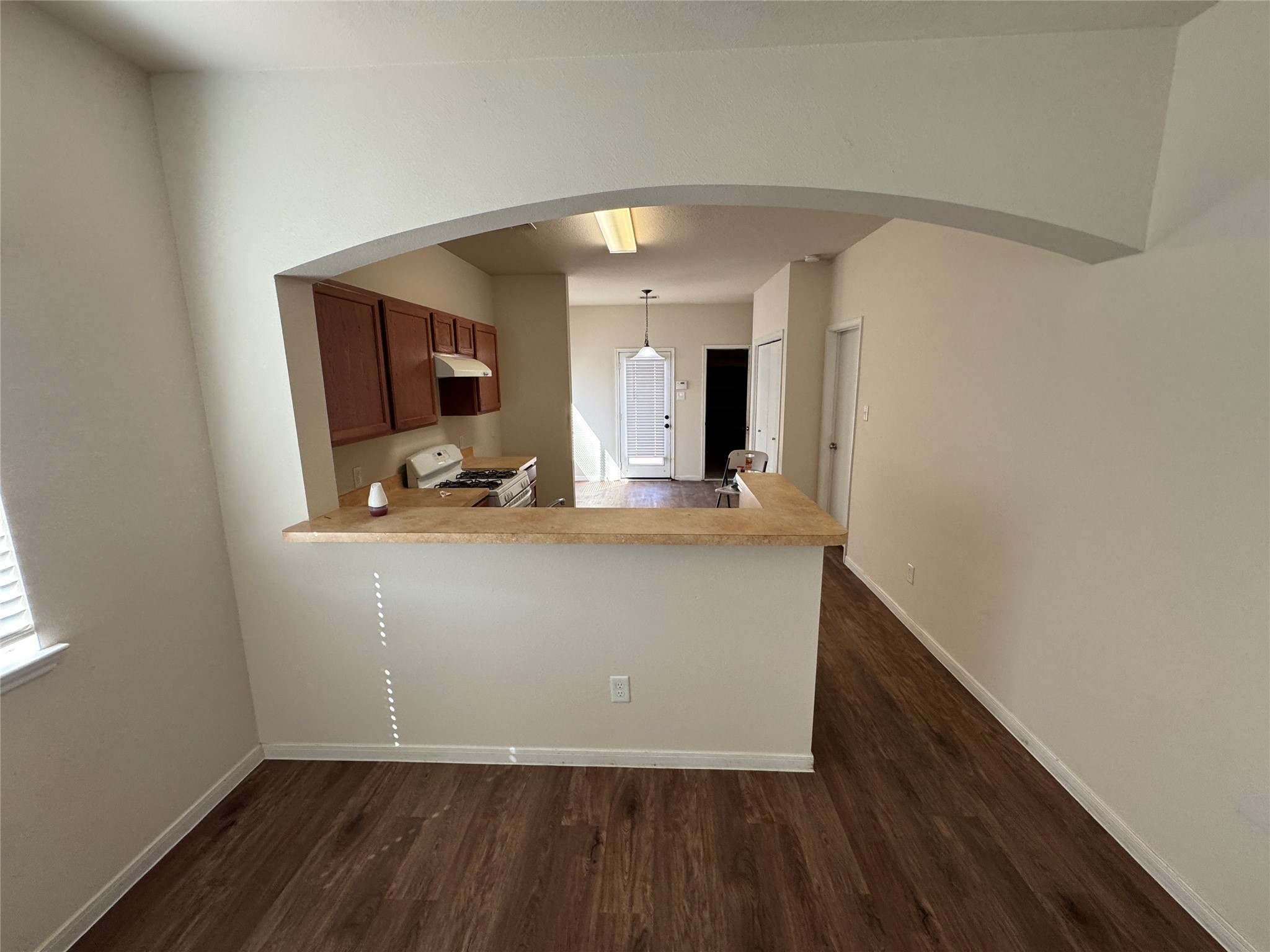 21719 Mossy Field Lane Spring, TX 77388 - Photo 10 of 44 a view of a hallway with wooden floor and staircase