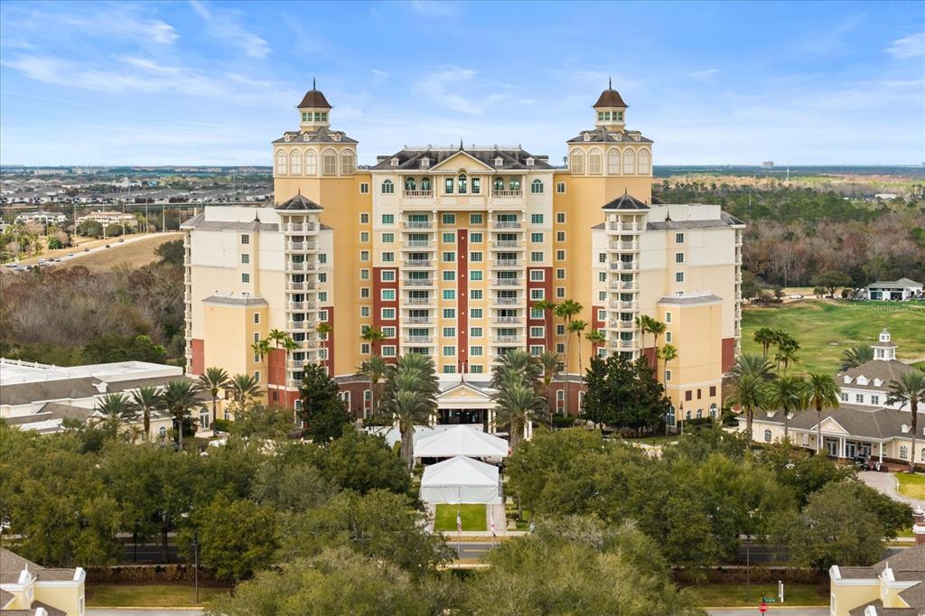 1114 Sunset View Circle, Unit 402 Reunion, FL 34747 - Photo 32 of 32 a view of a city with tall buildings