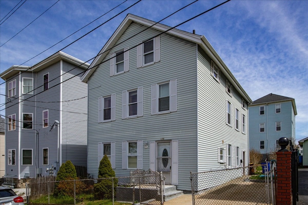 128 Diman Street Fall River, MA 02721 - Photo 1 of 42 a front view of a house with yard