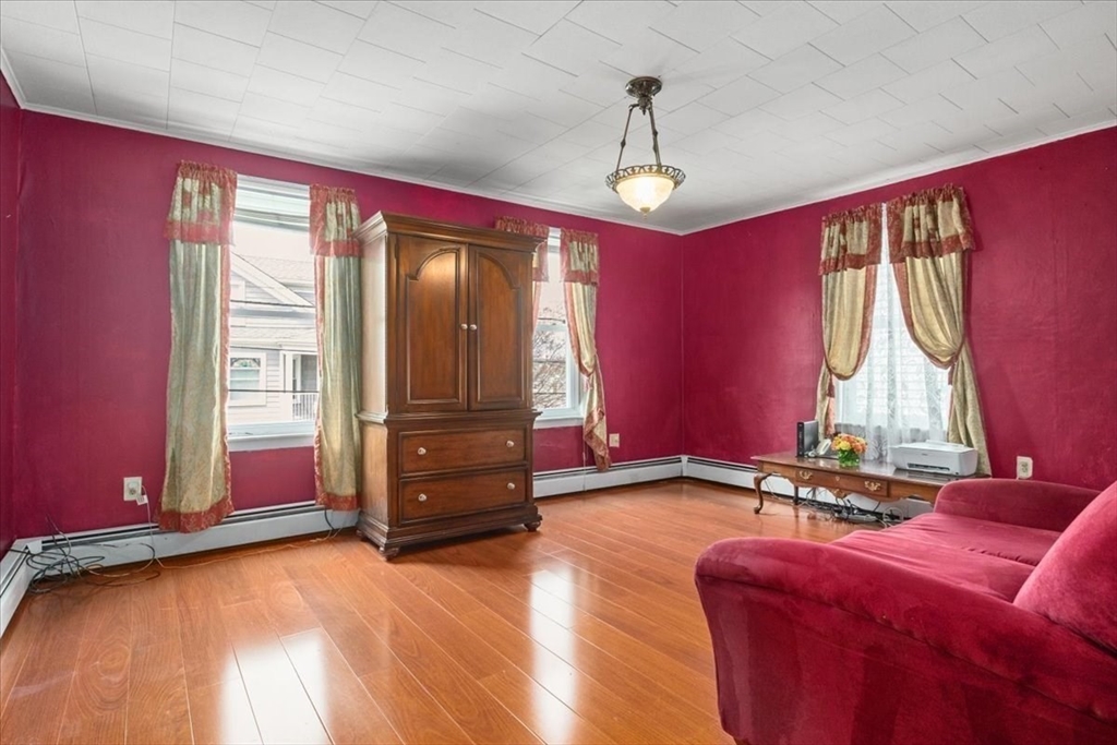 128 Diman Street Fall River, MA 02721 - Photo 15 of 42 a living room with furniture and windows