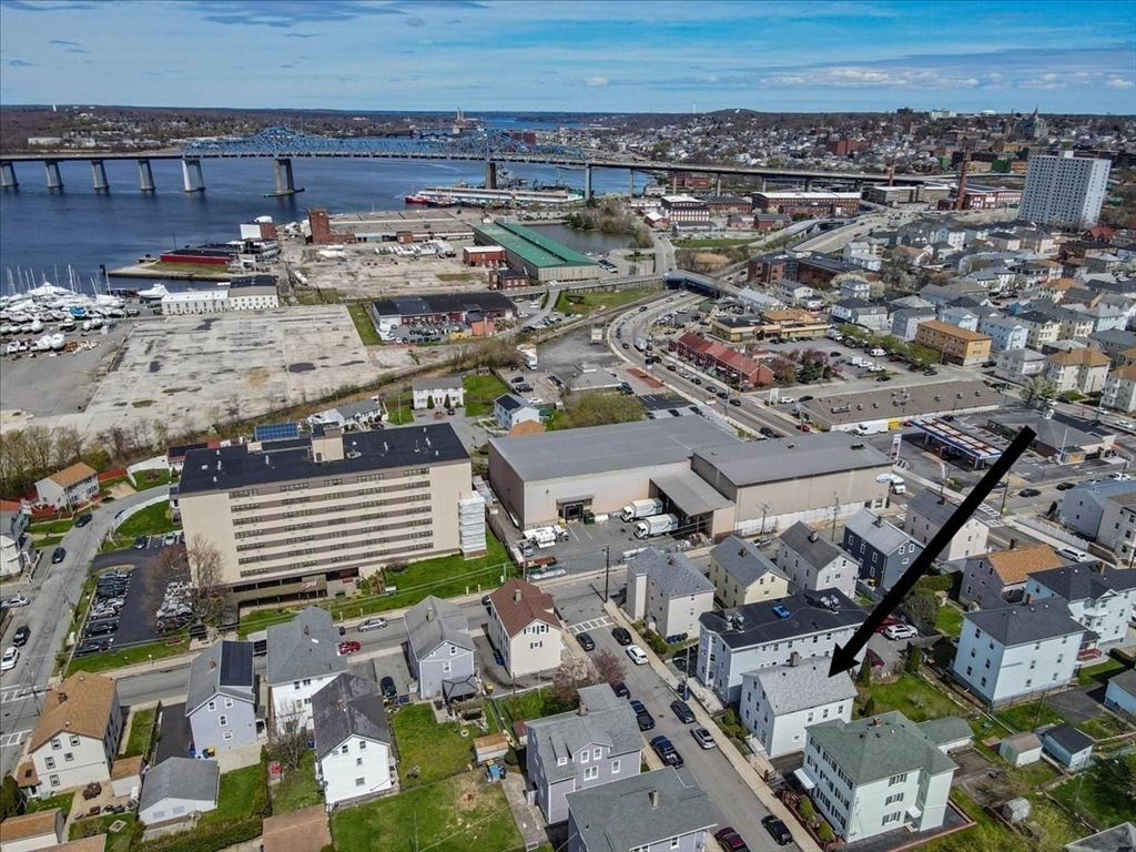 128 Diman Street Fall River, MA 02721 - Photo 38 of 42 an aerial view of a building with parking space