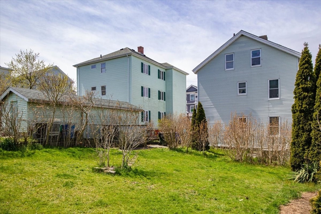 128 Diman Street Fall River, MA 02721 - Photo 41 of 42 a view of backyard with a garden and entertaining space