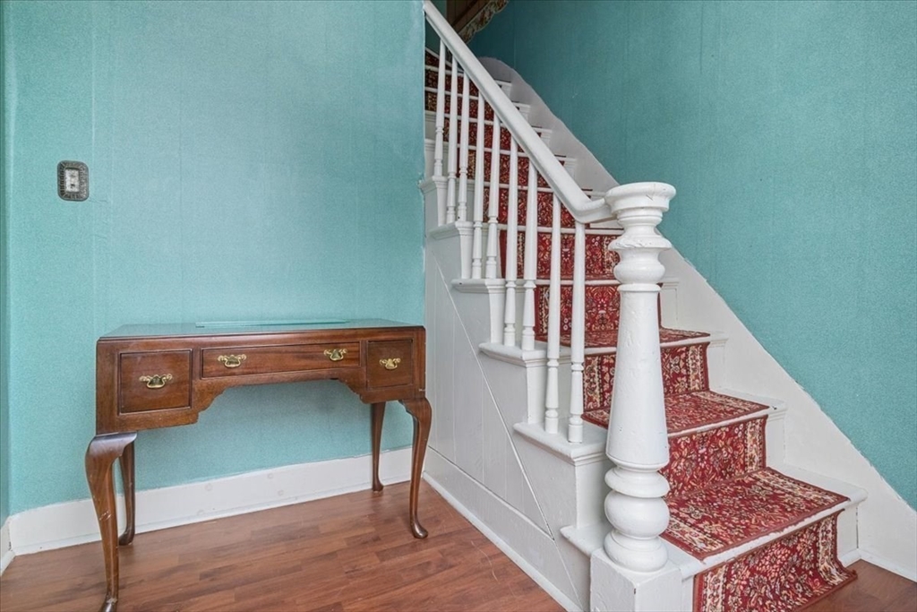 128 Diman Street Fall River, MA 02721 - Photo 5 of 42 a view of entryway with wooden floor
