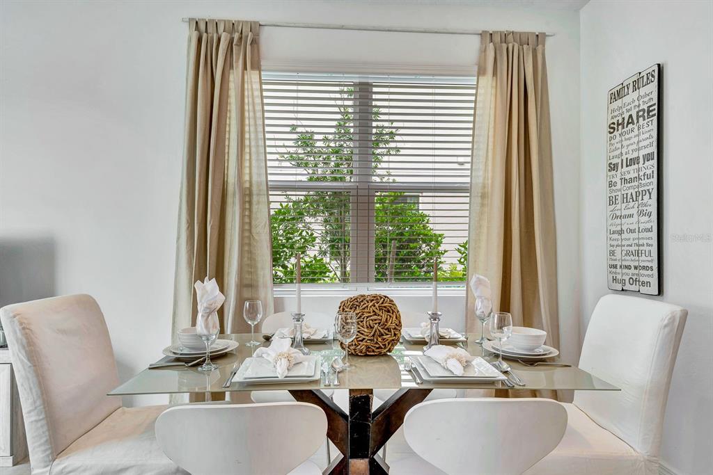 5715 Archipelago Street Nokomis, FL 34275 - Photo 12 of 52 a dining room with furniture and window